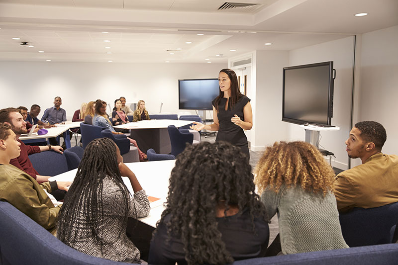Students learning in a classroom