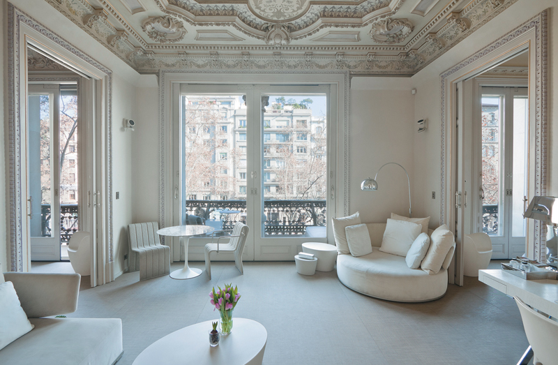 The Suite Principal Paseo de Gracia opens onto a sprawling terrace with sweeping views of the bustling Passeig de Gracia