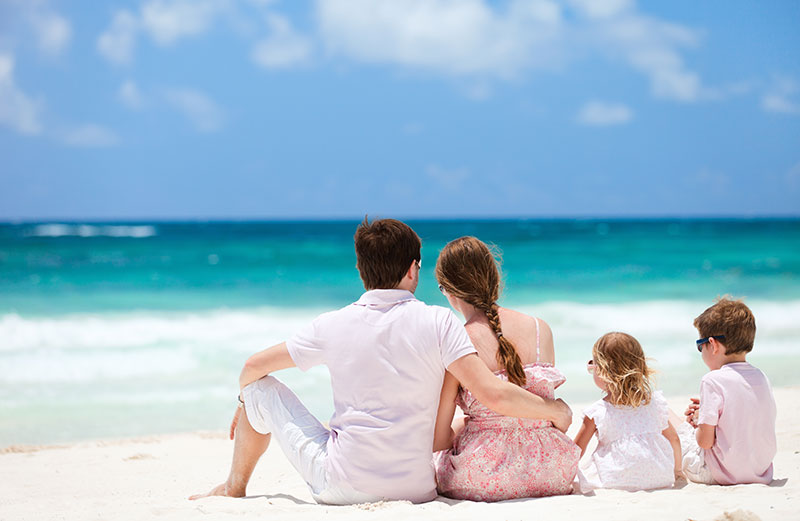 Family vacationing on a beach