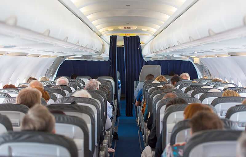 Airplane cabin with passengers