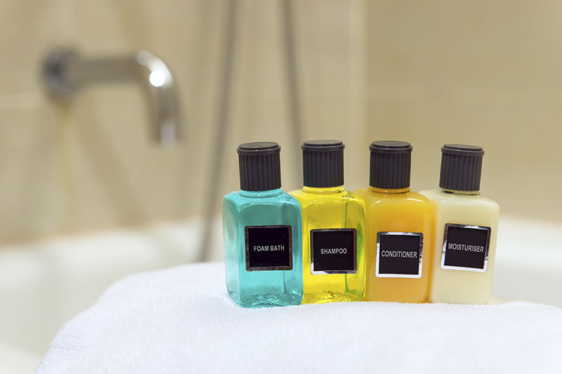 Hotel Toiletries on a white towel 
