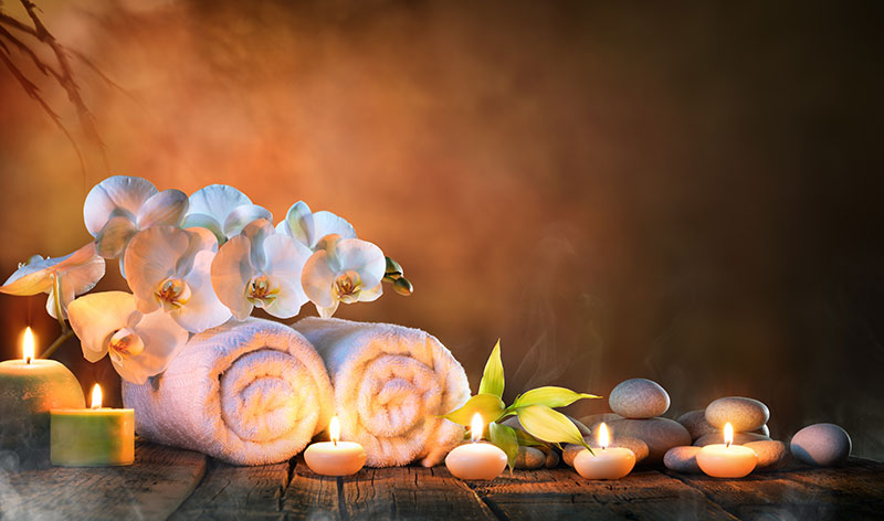 Towels and candles in a spa