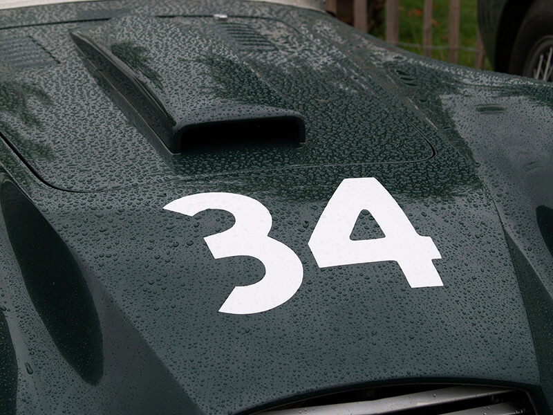  a black racecar hood with number 34 in white