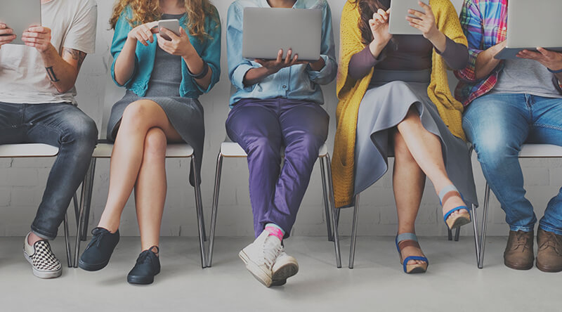 Group of people on laptops 