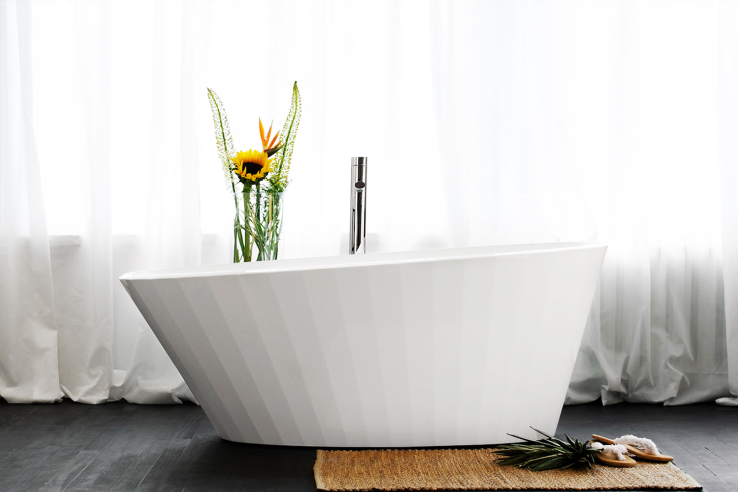 The bathtub collection designed by Patrick Messier has a design that follows a fluted shape and draws inspiration from the 