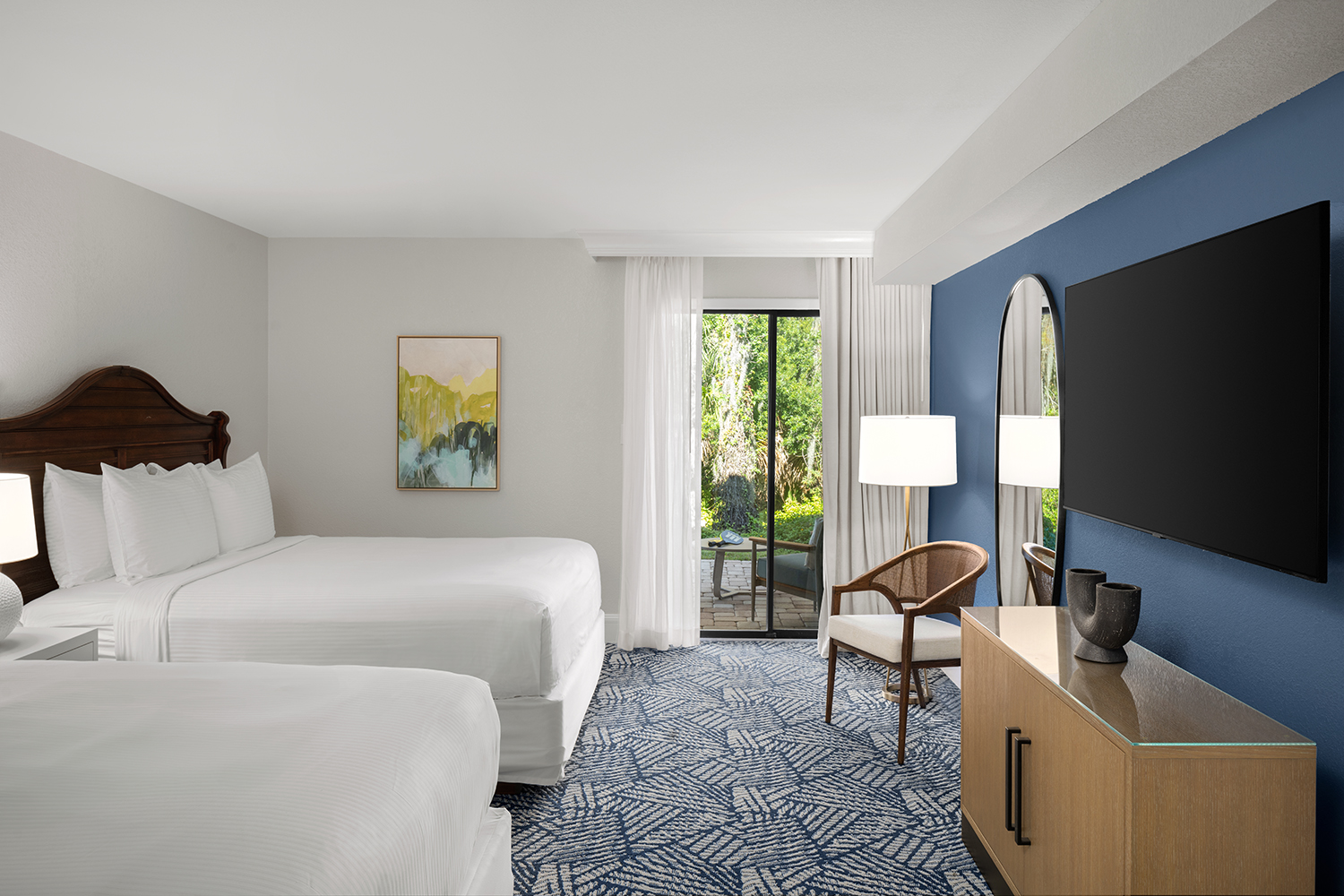 Saddlebrook Resort model guestroom in blue and white