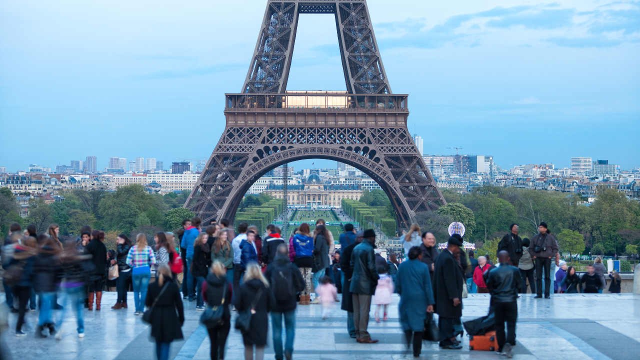 Tourists close to the Eiffel Tower in Paris