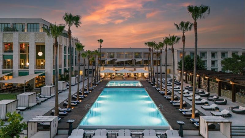 Victoria Golf Resort & Spa_Main Pool_Hotel_Evening_Photo by Accor