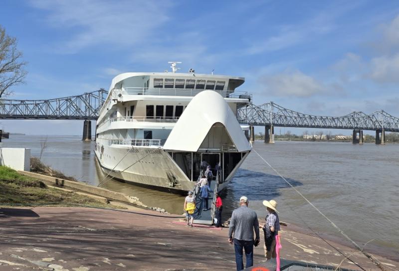 The bow of American Cruise Lines' American Serenade is raised, a gangway extends to the riverbank, and guests can simply walk ashore. No pier is needed.