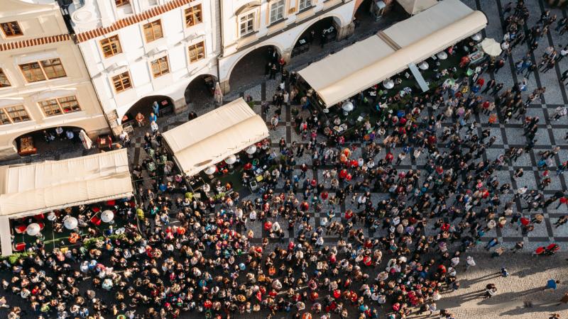 ew of large group of tourists at Prague old town square