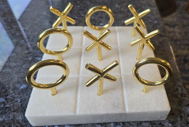 Tic tac toe board within Compass Lounge on Victory II.