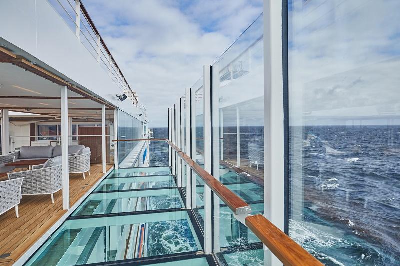Hapag-Lloyd Cruises Hanseatic Inspiration Extendable Glass Balcony off Pool Deck Photo provided courtesy of Hapag-Lloyd Cruises Editorial Use Only Hapag-Lloyd Cruises Hanseatic Inspiration Extendable Glass Balcony off Pool Deck Photo provided courtesy of Hapag-Lloyd Cruises Editorial Use Only