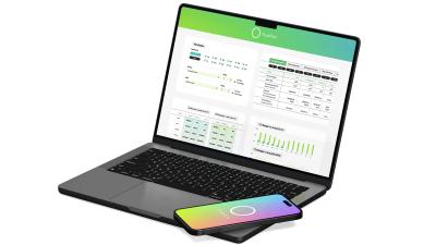 Laptop computer and phone with Otelier app open