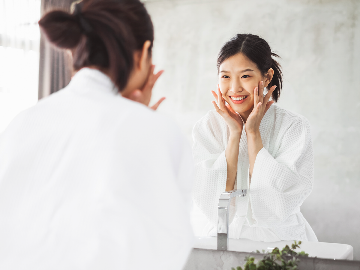 Girl washing her face