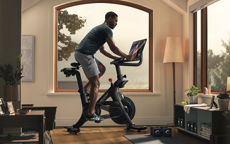 Man on Peloton Bike Plus