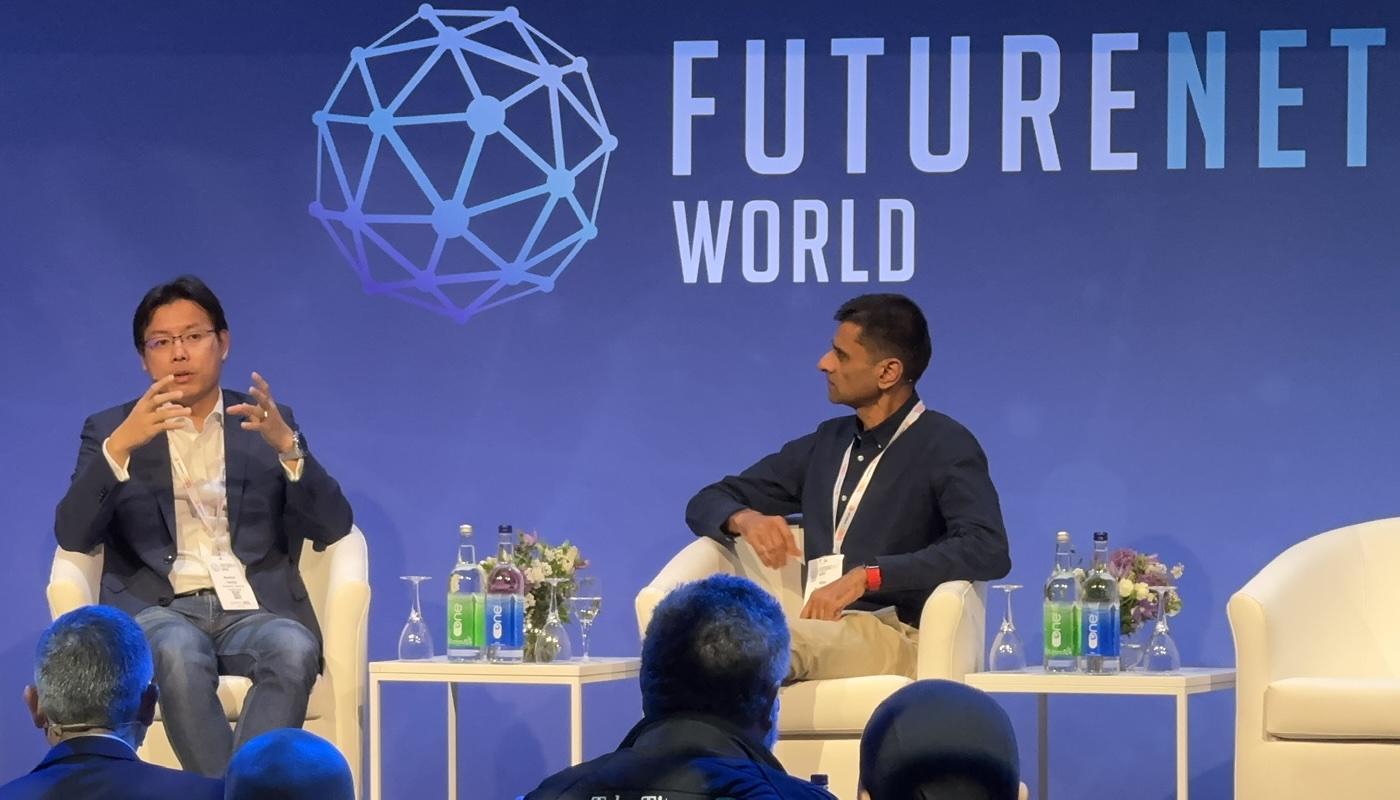 Damien Leong of Hutchison Telecom Hong Kong speaks on stage with Vijay Sivaraman of Canopus Networks during a panel at Future