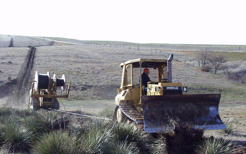 Plowing fiber optic cable in Northwest Kansas Image Rural Telephone via USDA Flickr stream