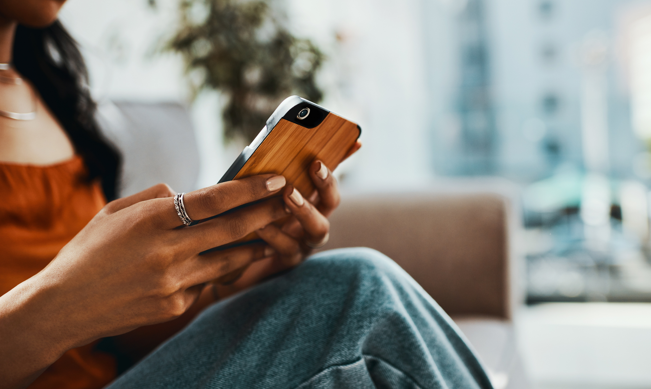 person texting on smartphone