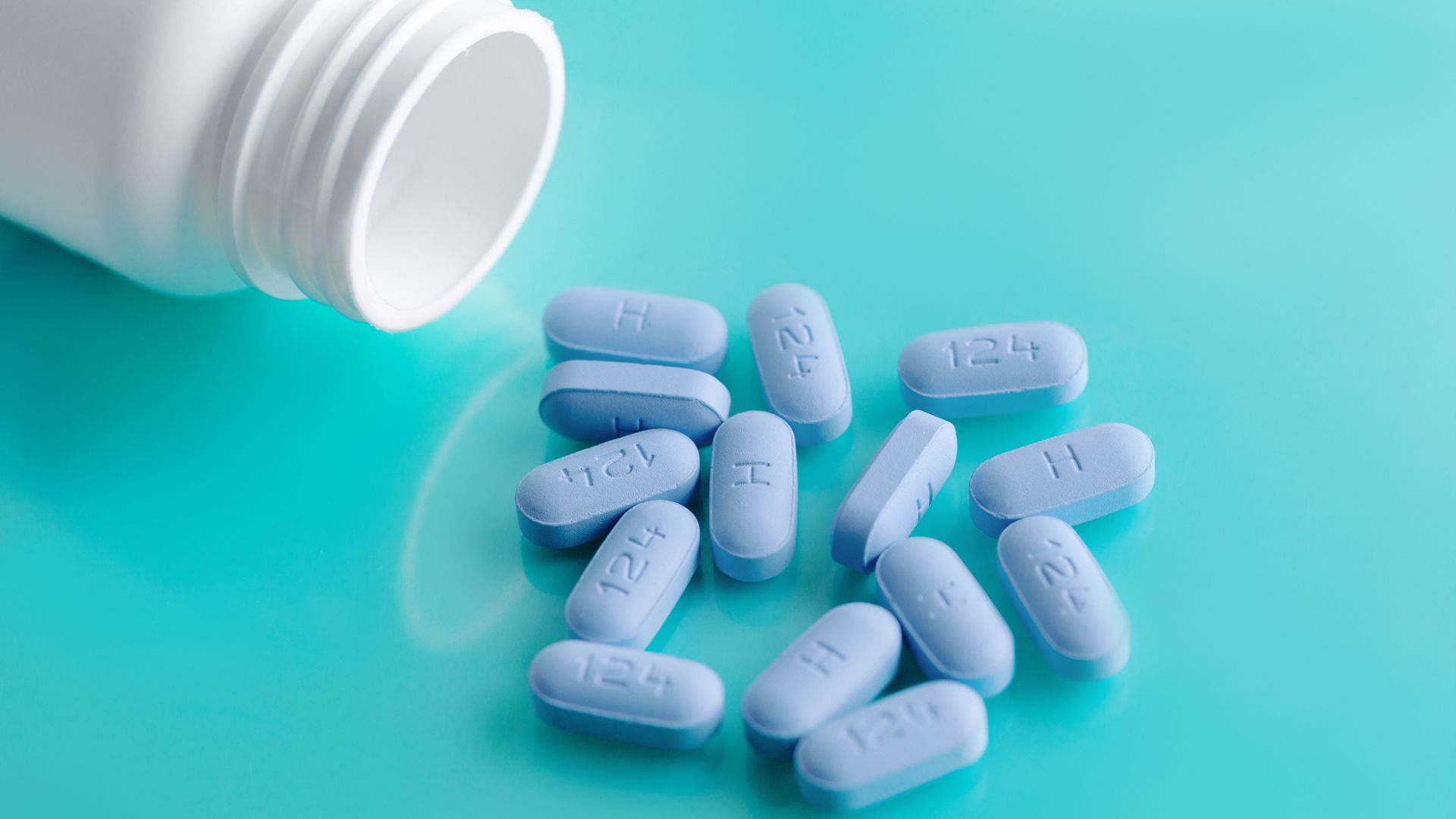 Open bottle of prescription PrEP pills