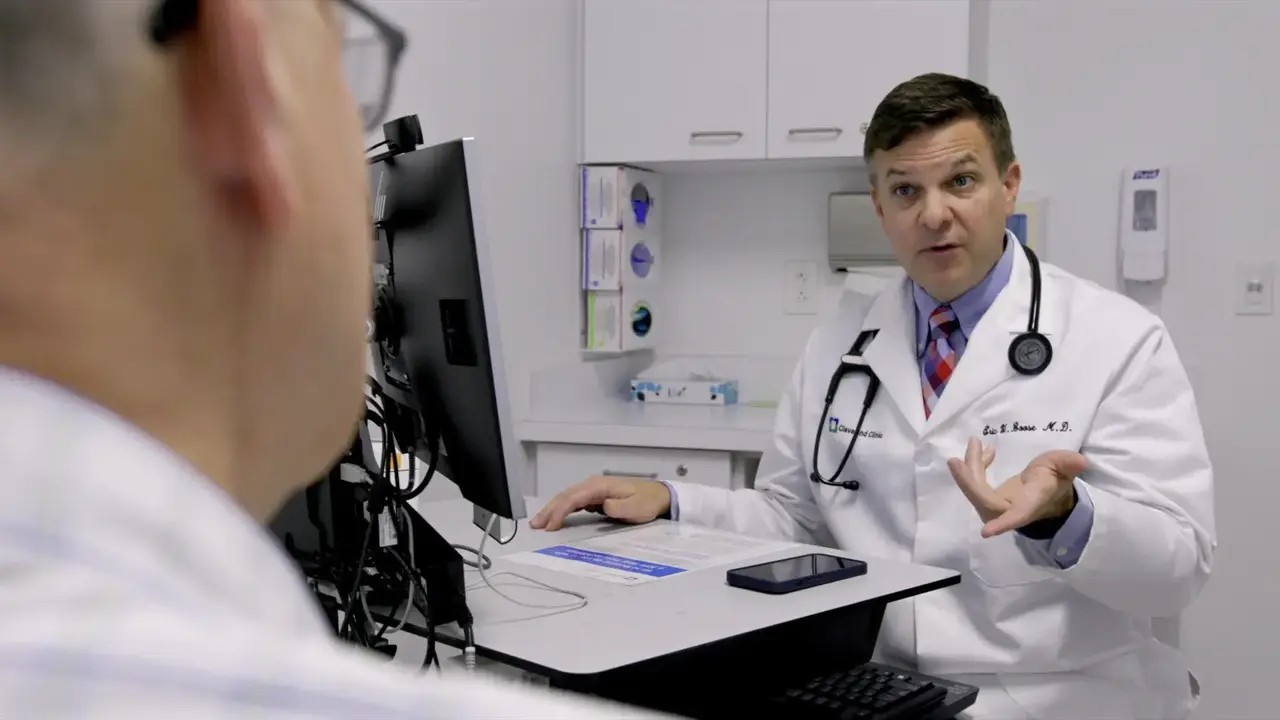 Dr Eric Boose uses AI software to document a patient appointment