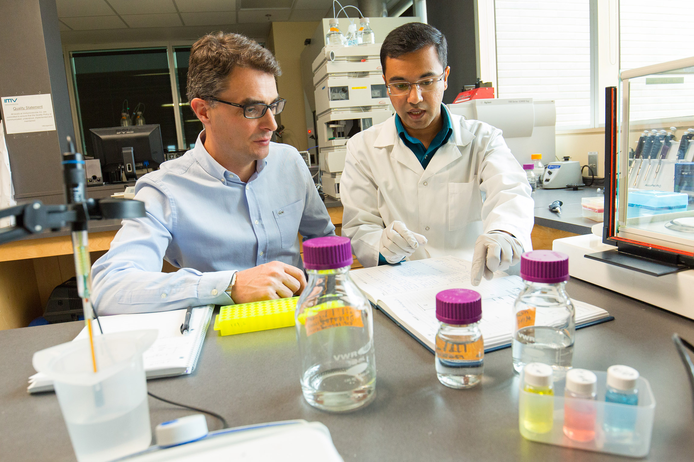 Fred Ors in lab with scientist
