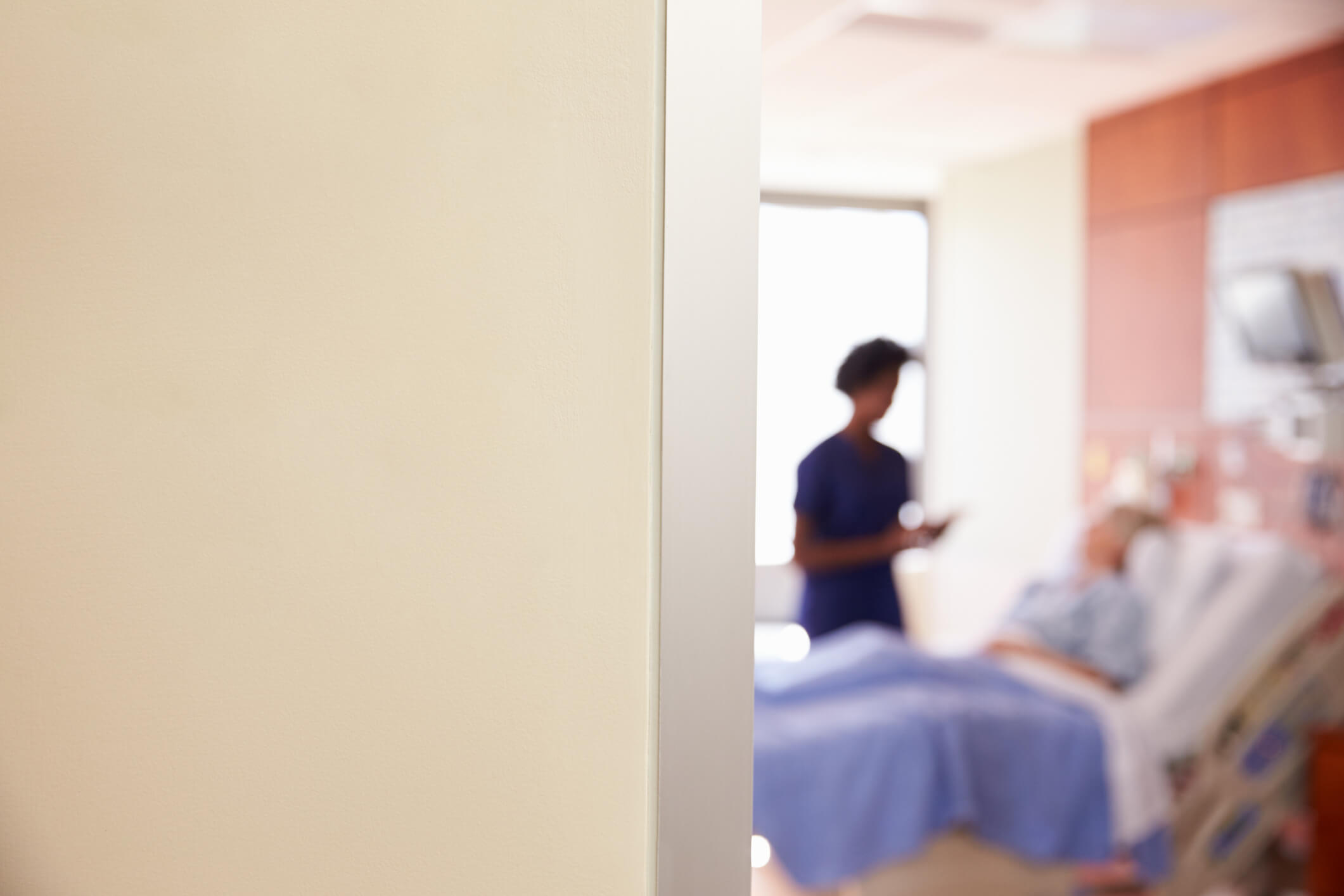 Patient and nurse in hospital