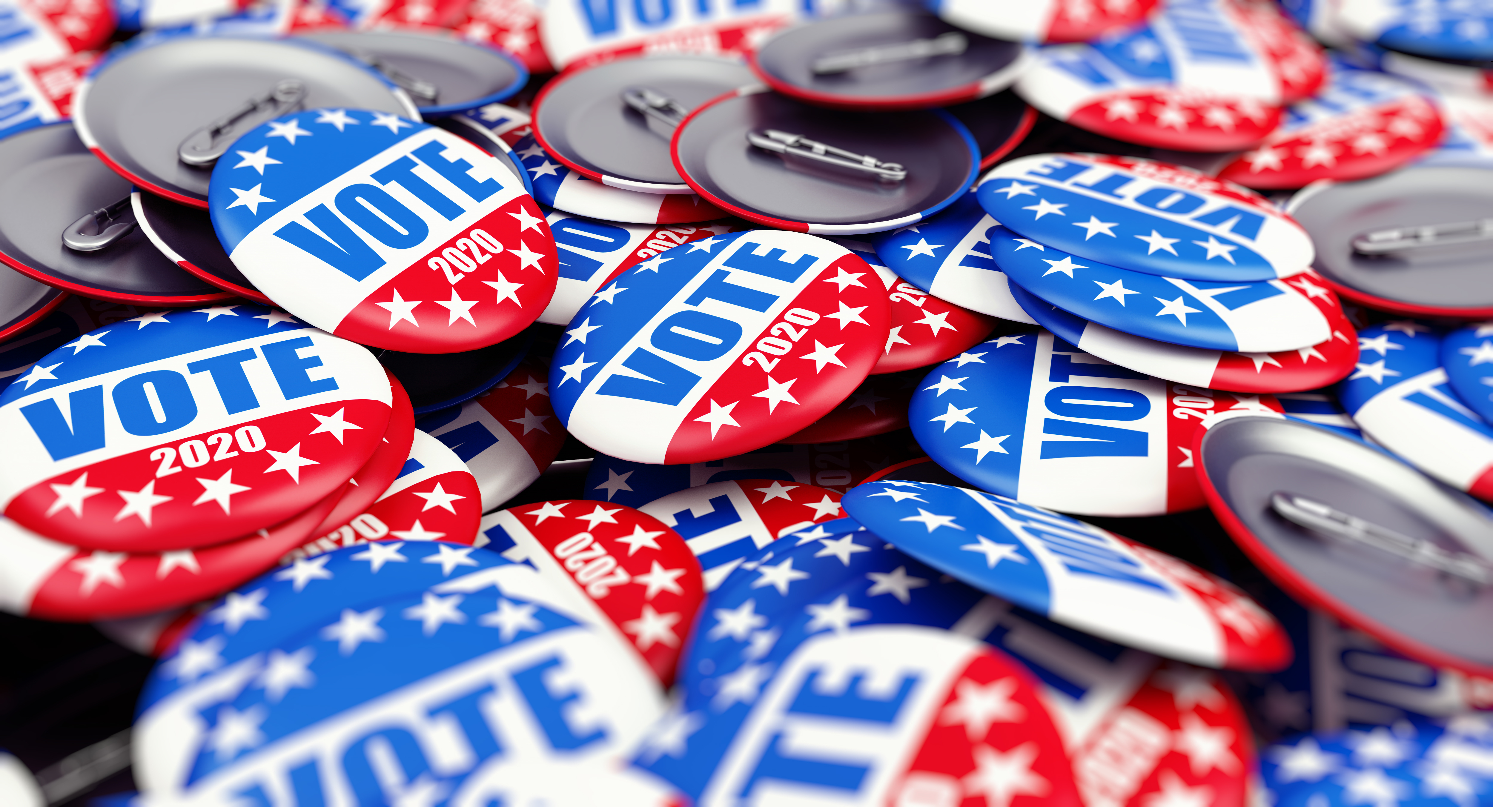 A pile of buttons that read Vote 2020