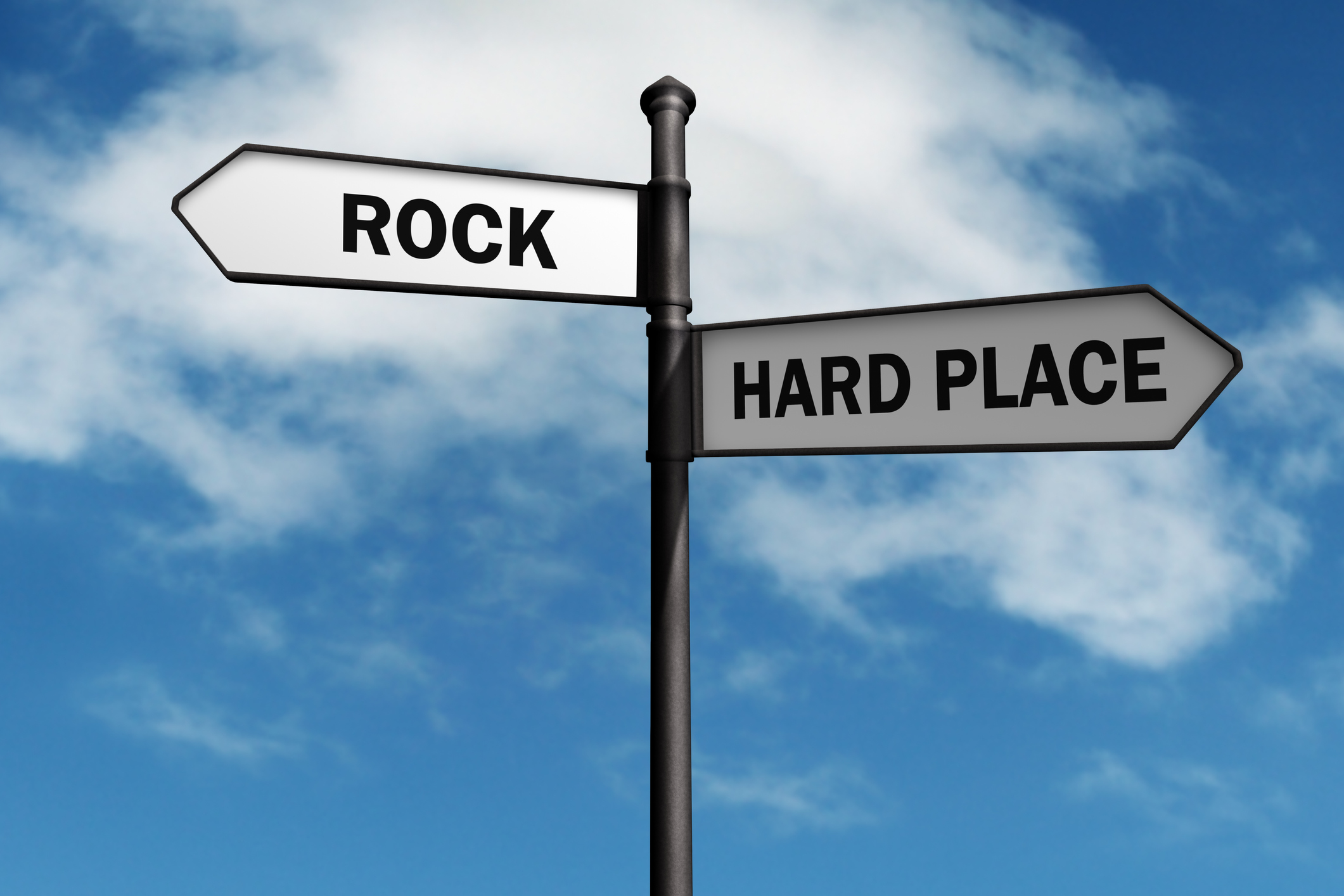 A sign labled rock and hard place