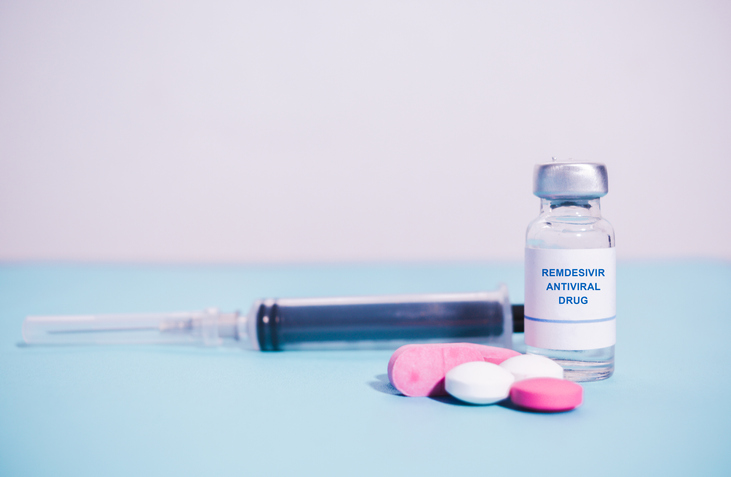 A bottle and syringe that include a dose of remdesivir