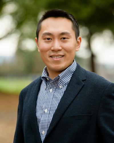 A headshot of PostEra co-founder Alpha Lee