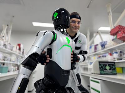 Insilico's lab robot and founder